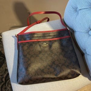 COACH, chocolatey, brown, and Red Cross body.  Like new